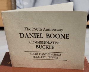 Front View of 250th Anniversary Belt Buckle Booklet