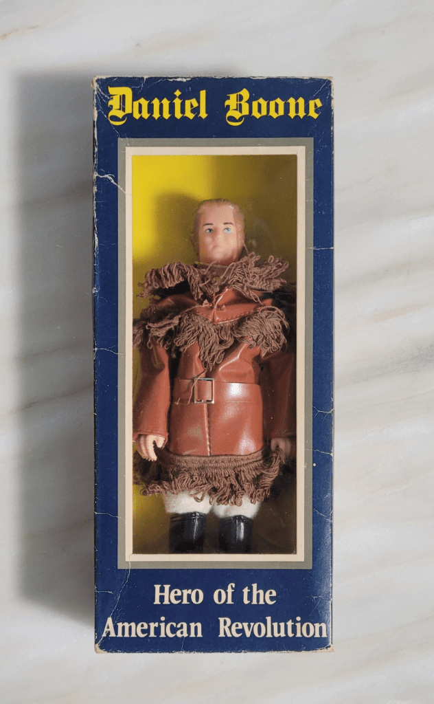 Front View of Daniel Boone in Box With Flap Folded