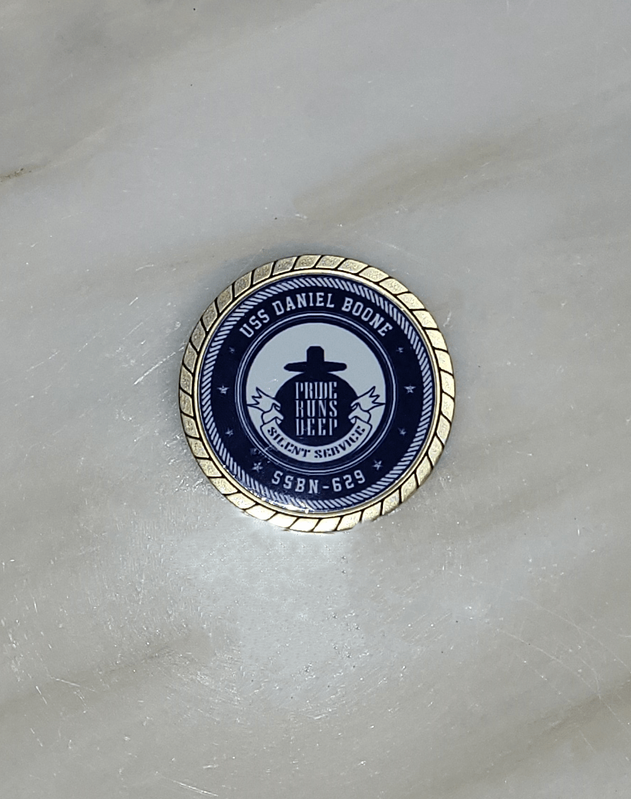 Front of USS Daniel Boone Challenge Coin