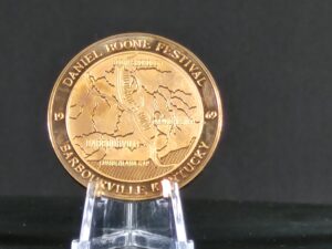 Reverse of Daniel Boone Enters Kentucky Daniel Boone Festival Barbourville Kentucky Coin